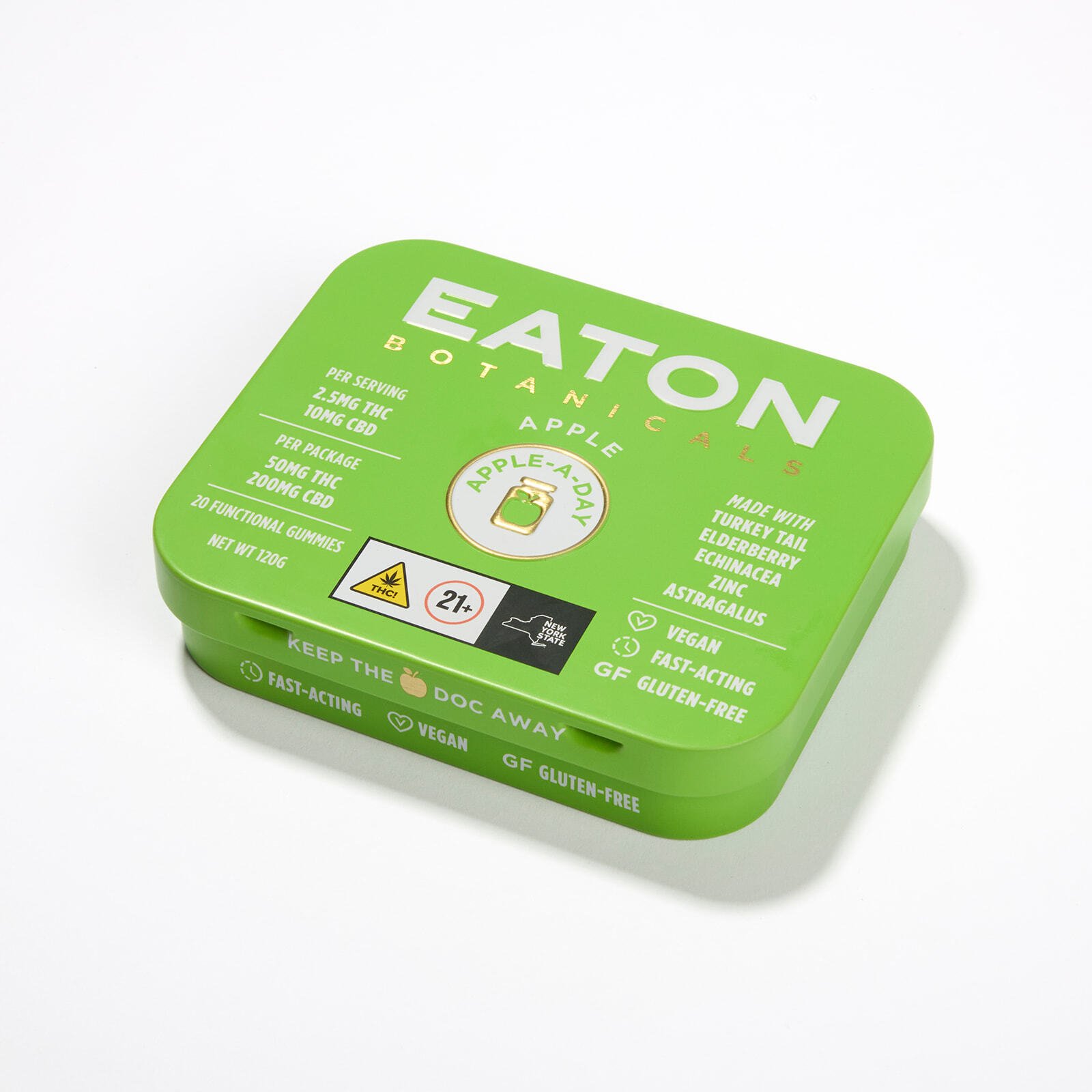 Side view of Apple A Day microdose THC gummy tin showing label details