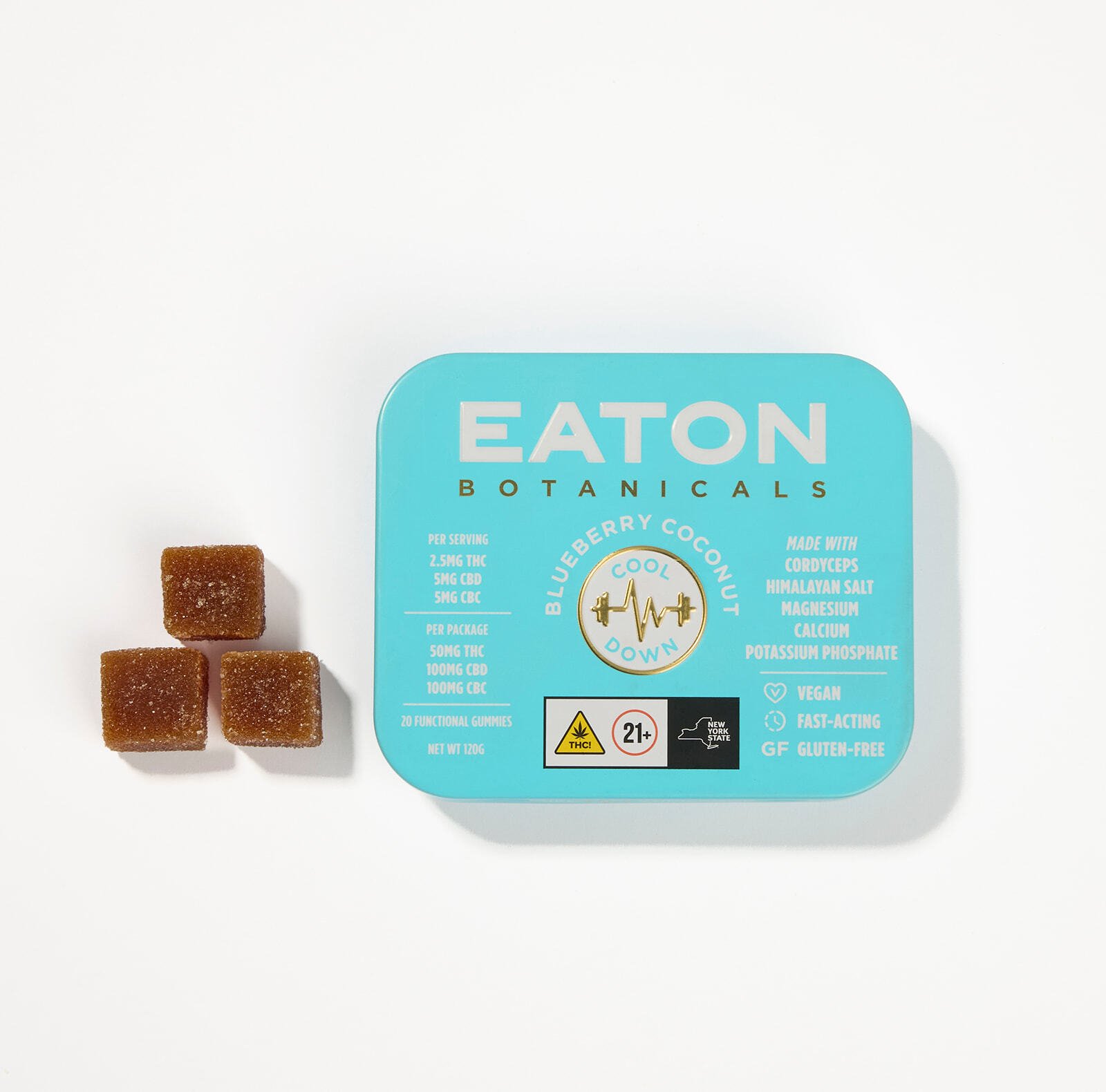 Cool Down microdose THC gummies displayed beside tin