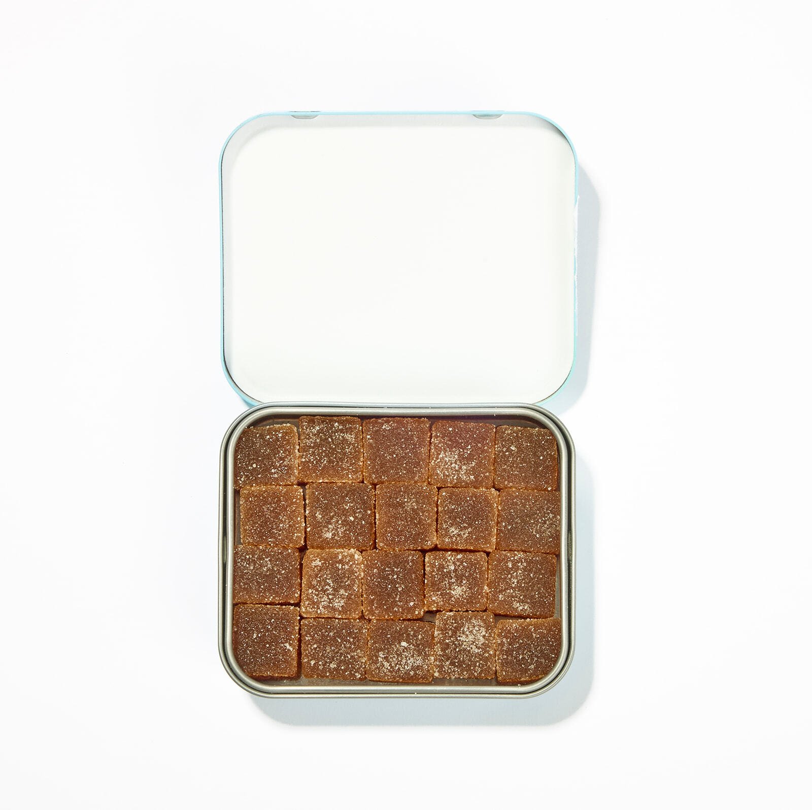 Open tin of Cool Down microdose THC gummies