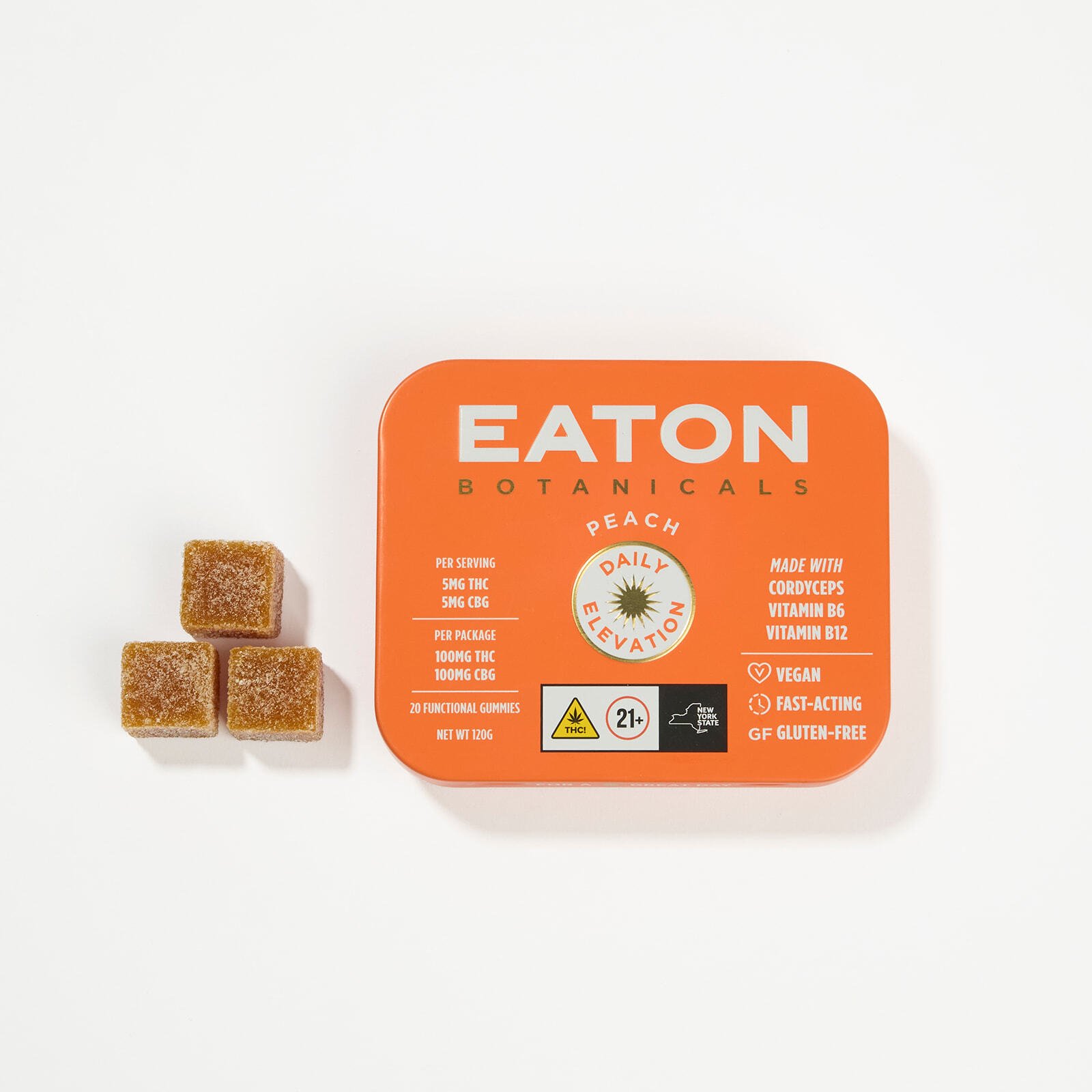 Daily Elevation THC gummies displayed beside open tin